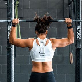 strong woman doing a pullup