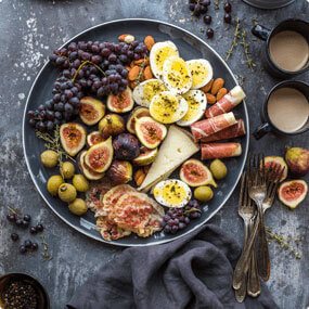 figs and eggs and olives plate