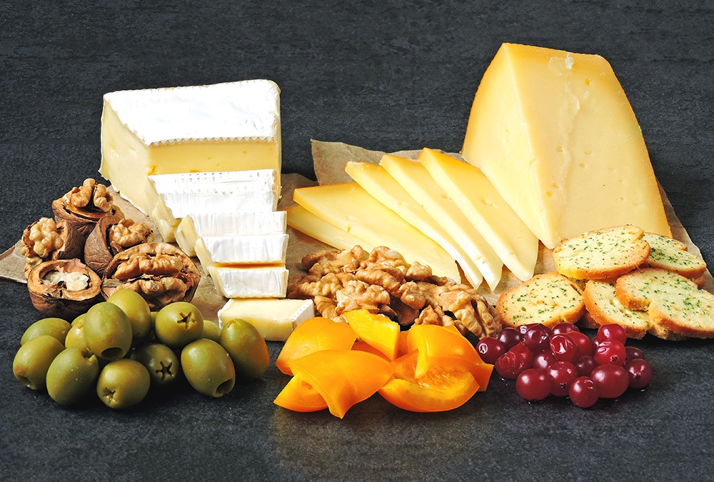 cheese and olives and crackers and fruits