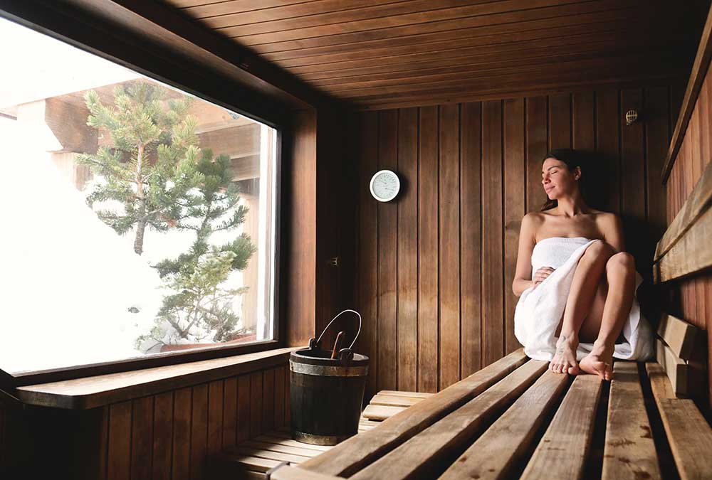 lady enjoying dry sauna