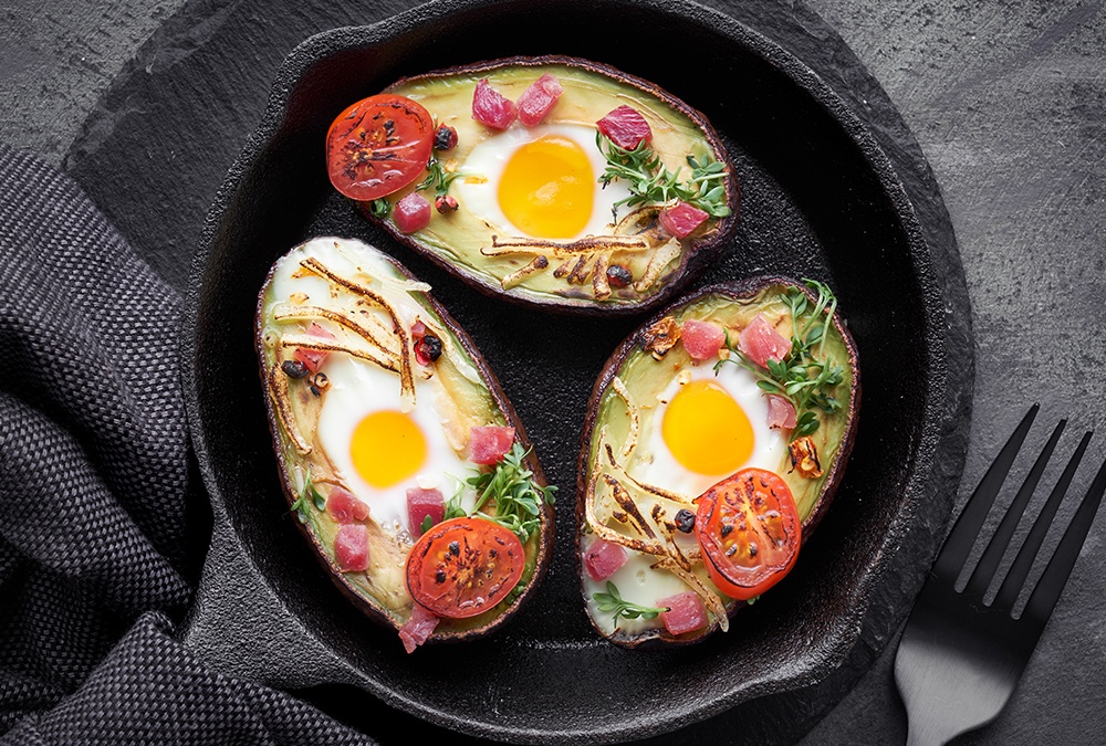baked keto avocados with egg and tomato